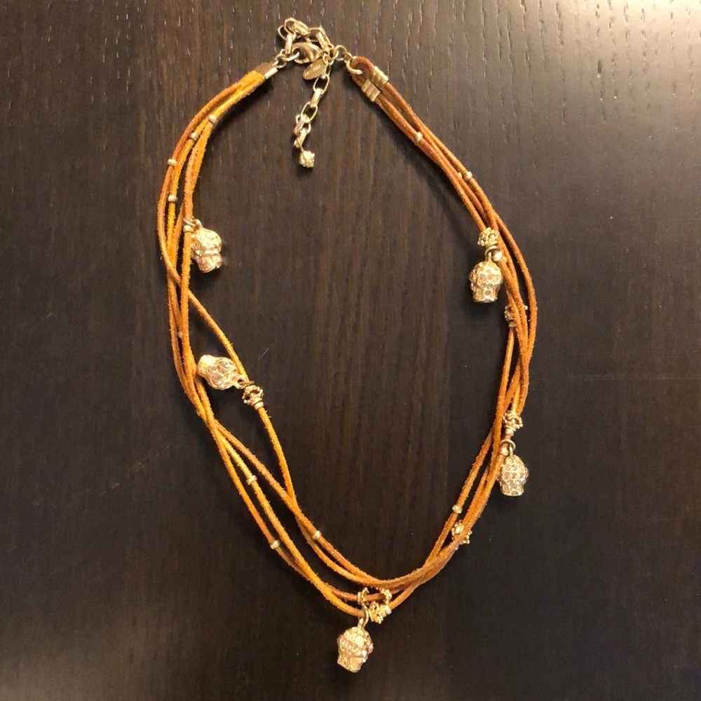 Super cute multi strand suede and skull necklace